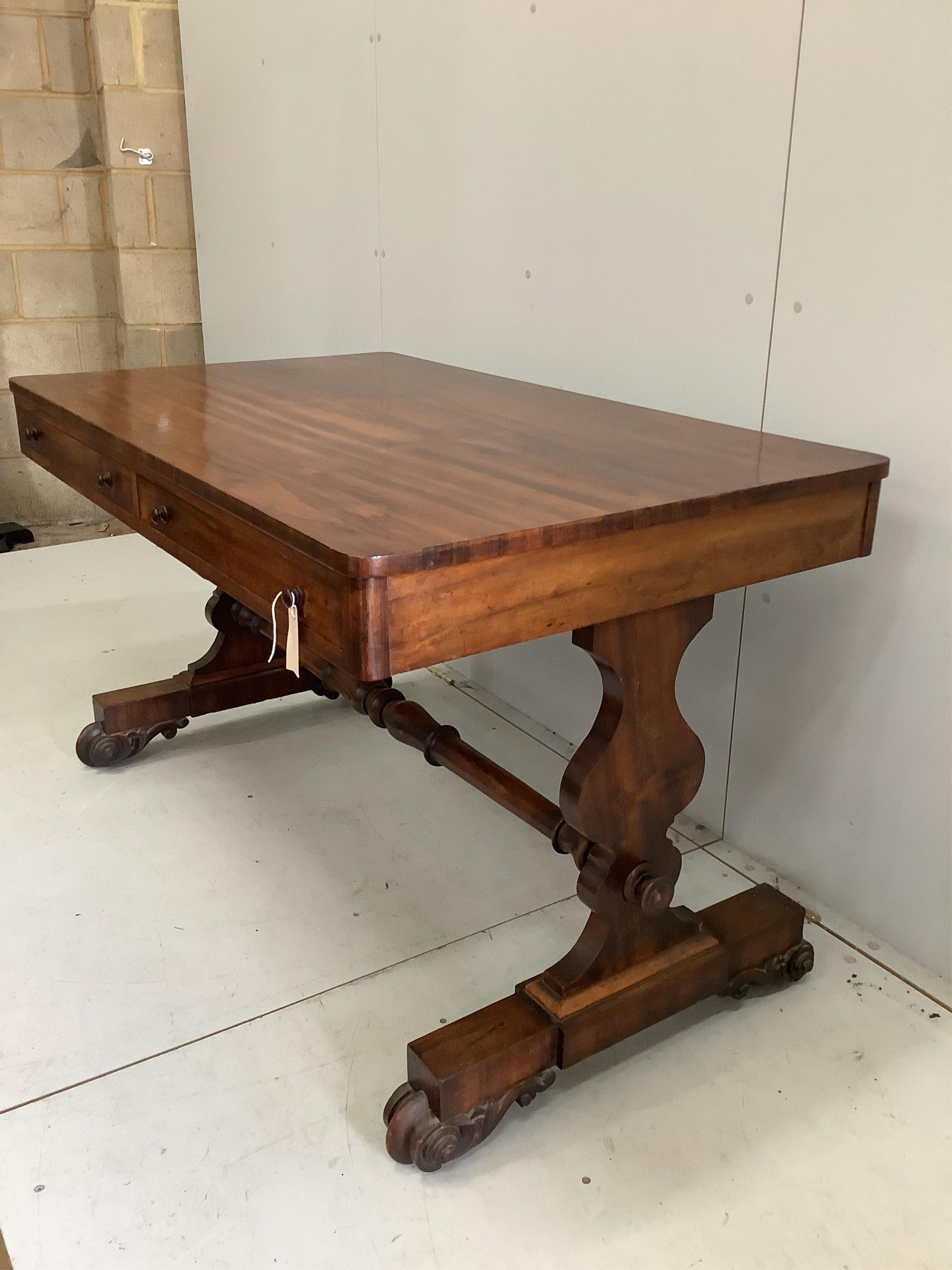 A Regency rosewood library table, width 125cm, depth 75cm, height 74cm. Condition - fair